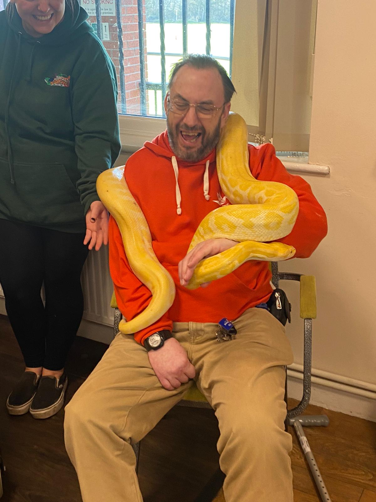 Dave Owen handling a snake from Animal Interactive.